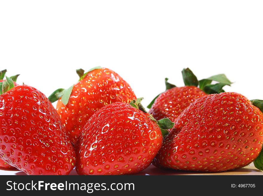 Ripe fresh strawberries isolated on white background