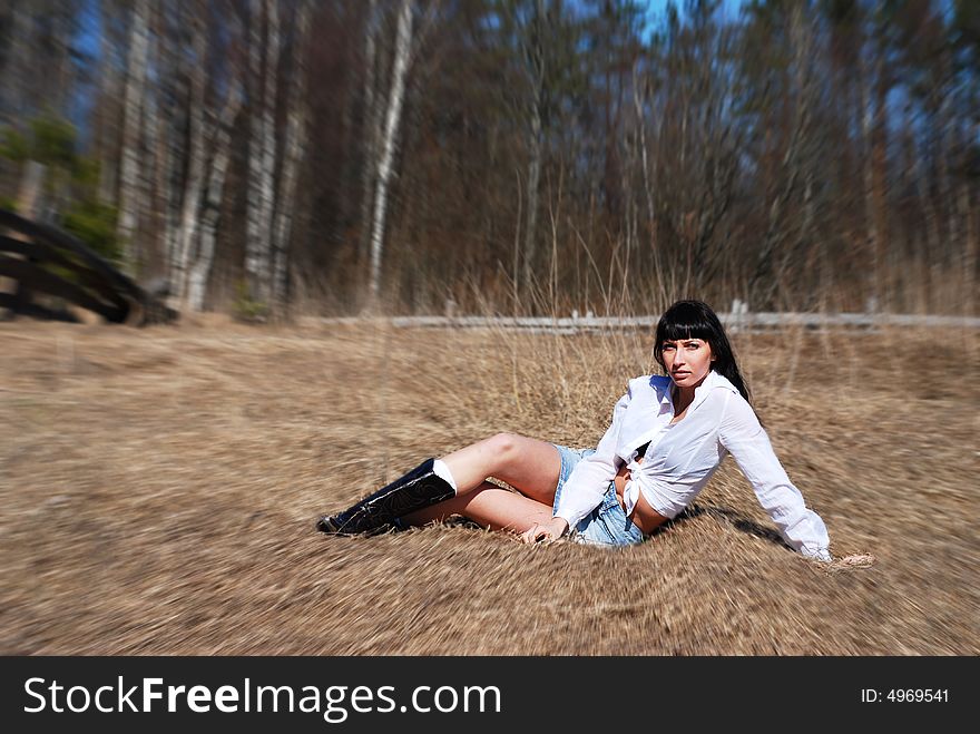 Spring, the girl in field, Leningrad region, Russia. Spring, the girl in field, Leningrad region, Russia