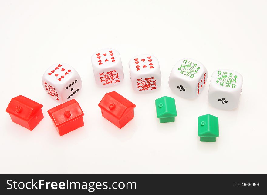 Poker dice and houses to illustrate the property market