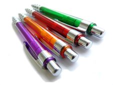Four Colored Pens Stock Photo