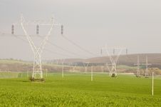 Electricity Pylons In The Green Fields Stock Image Electricity Pylons In The Green Fields Stock Image