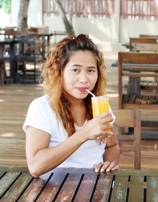 Girl Drinking Juice. Stock Image