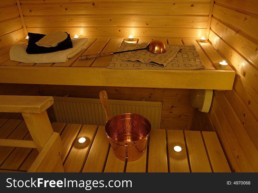 Interior of a Finnish sauna in candle light