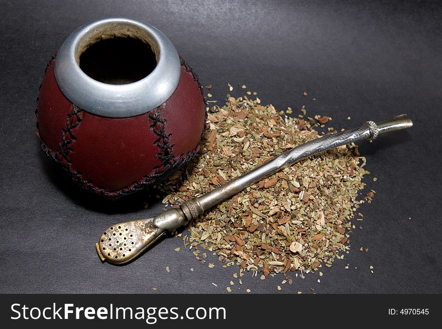 Сup from calabash with yerba mate tea and straw. Сup from calabash with yerba mate tea and straw.