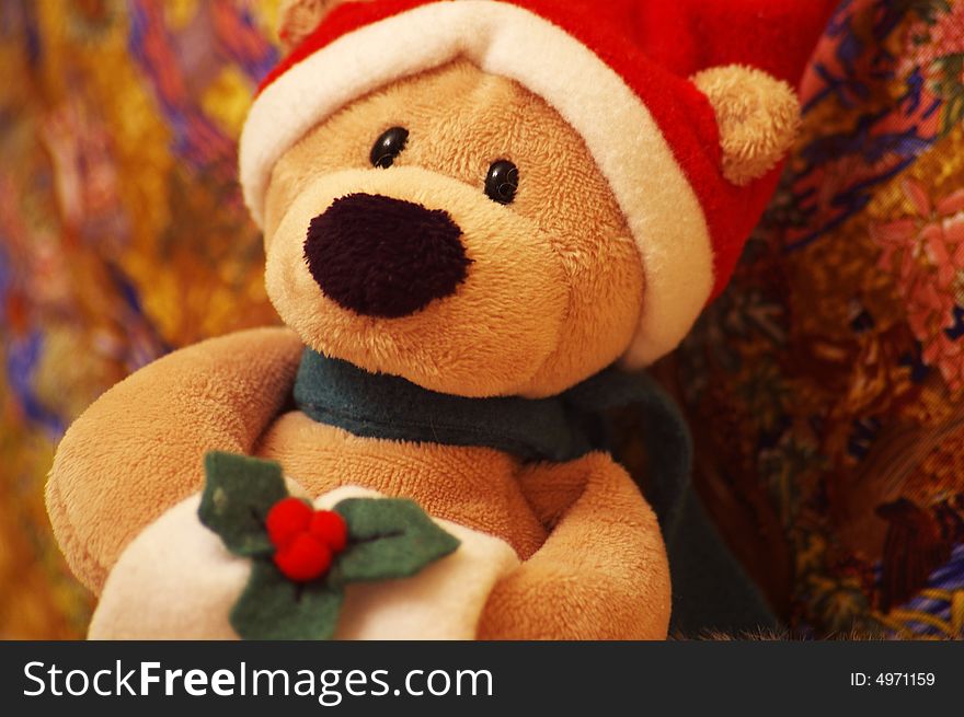 In a special way decorated toy bear as a  Christmas gift. In a special way decorated toy bear as a  Christmas gift
