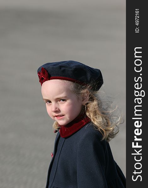 Little girl walking near the sea. Little girl walking near the sea