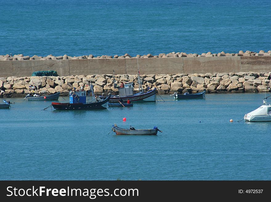 Blue Fishing Boats In Harbor