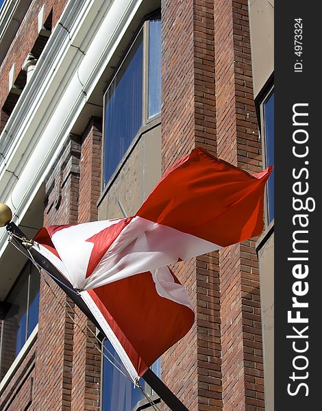 Canadian flag in front of administrative building