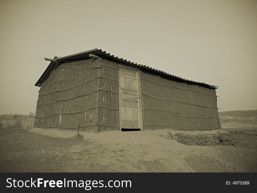 Hut made of mud cow dung and cane in monotone. Hut made of mud cow dung and cane in monotone