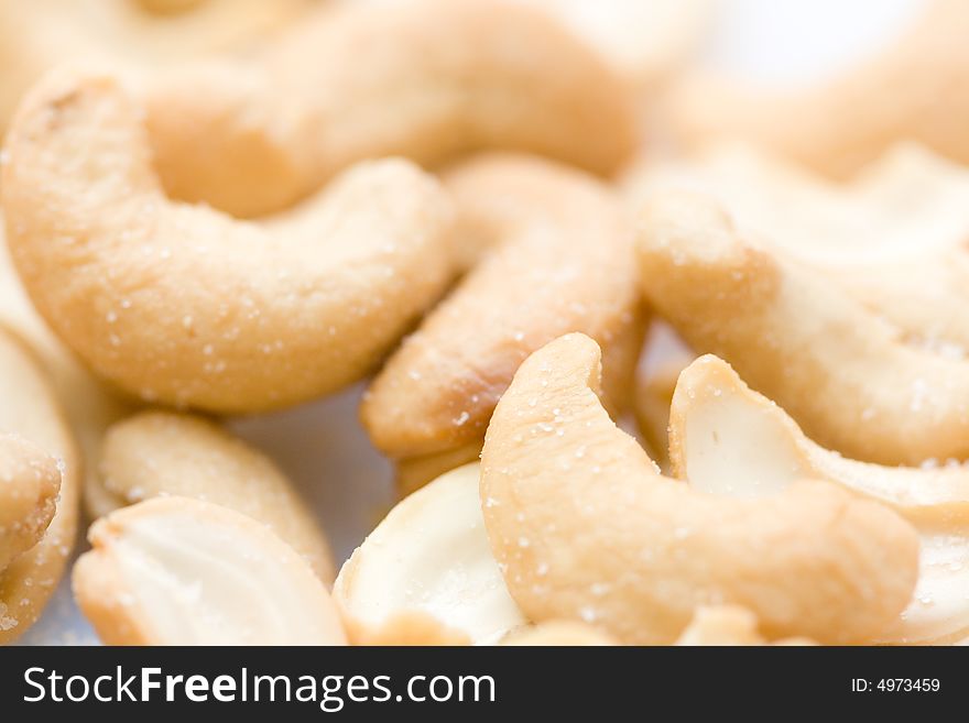 Heap of salted cashew close-up. Heap of salted cashew close-up