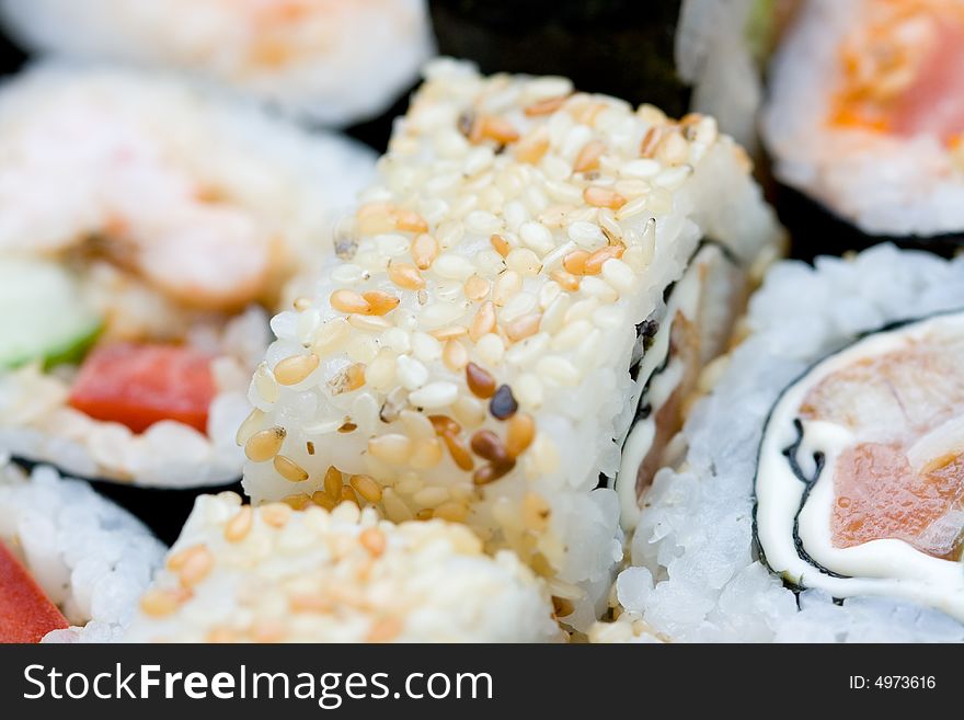 Different types of traditional japanese rolls close-up. Different types of traditional japanese rolls close-up