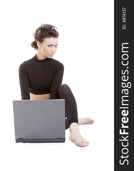 Sexy woman with a laptop isolated on white. Sexy woman with a laptop isolated on white