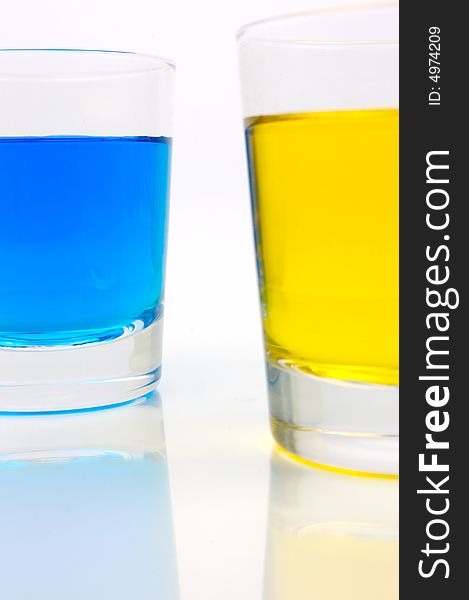 Glasses of soft drink isolated against a white background. Glasses of soft drink isolated against a white background