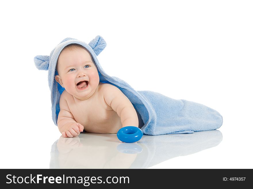 Small smiling baby with a towel isolated