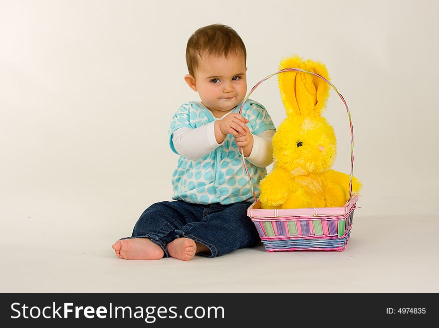 Baby with an easter basket and Eater Bunny - and may not want to share. Baby with an easter basket and Eater Bunny - and may not want to share