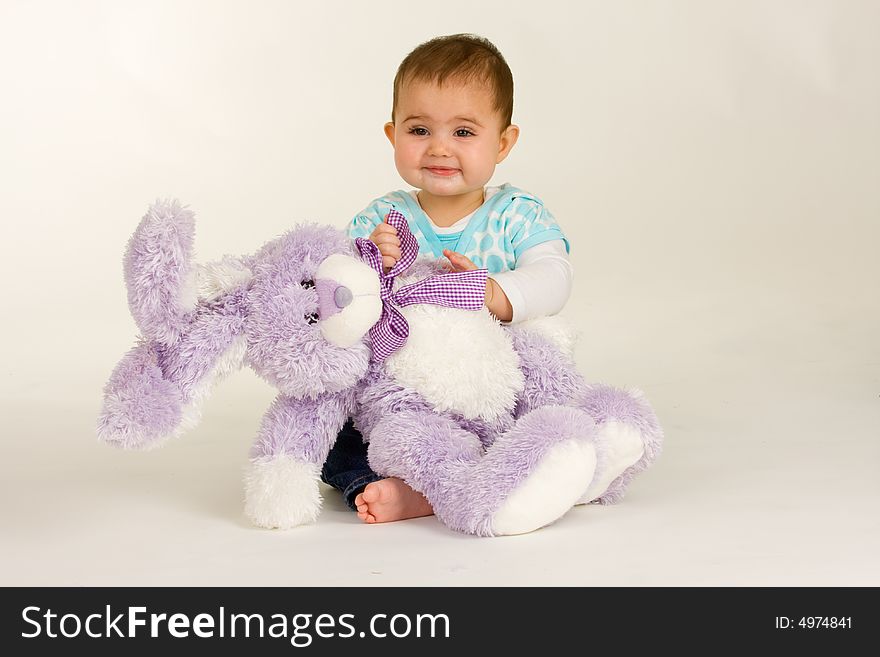 Baby with an Easter Bunny - and is very happy. Baby with an Easter Bunny - and is very happy