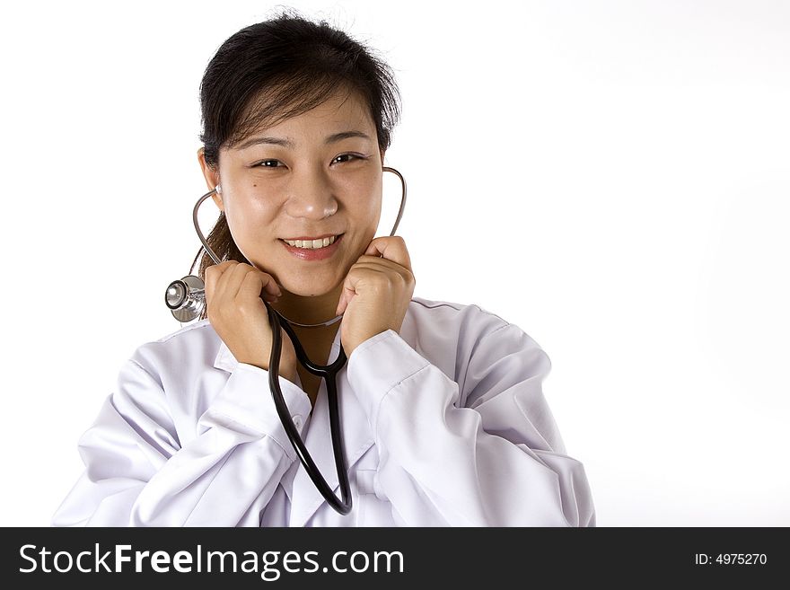 Female doctor with stethoscope in white background. Female doctor with stethoscope in white background.