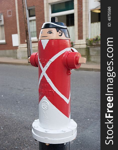 Painted Fire Hydrant Man in a town