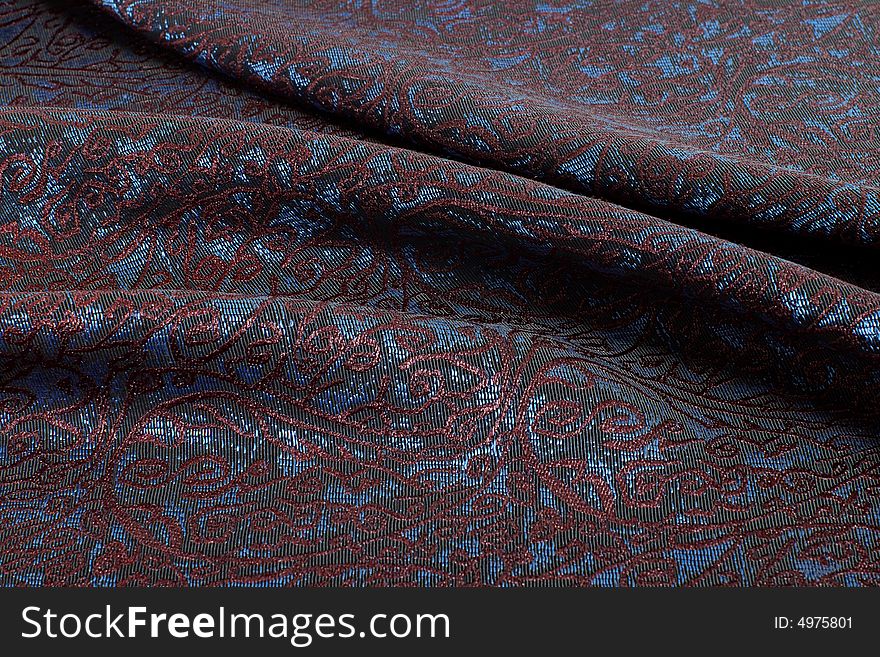 Brocade in dark it is red violet tones. Brocade in dark it is red violet tones