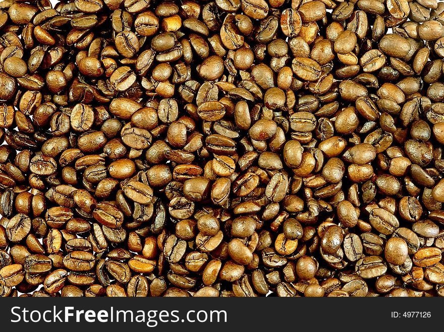 Roasted coffee bean's  dark  background. Roasted coffee bean's  dark  background