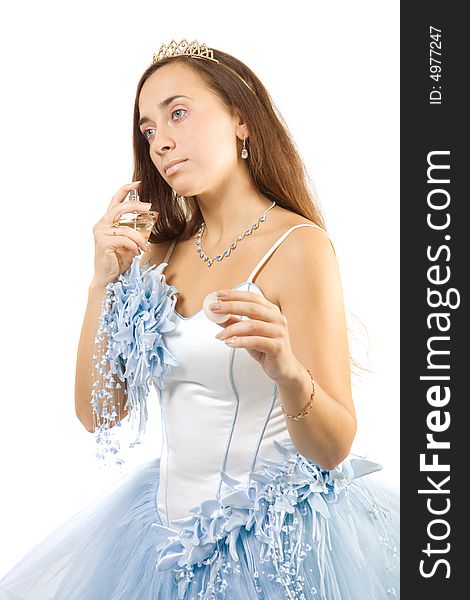 Beauty bride in blue dress with perfume. Isolate on white