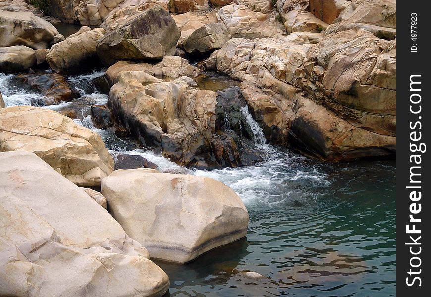 Water flow from strange stone. Water flow from strange stone