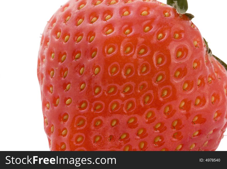 Red and ripe strawberry on a white background