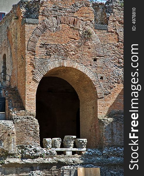 Greek ruins with arch in Sicily