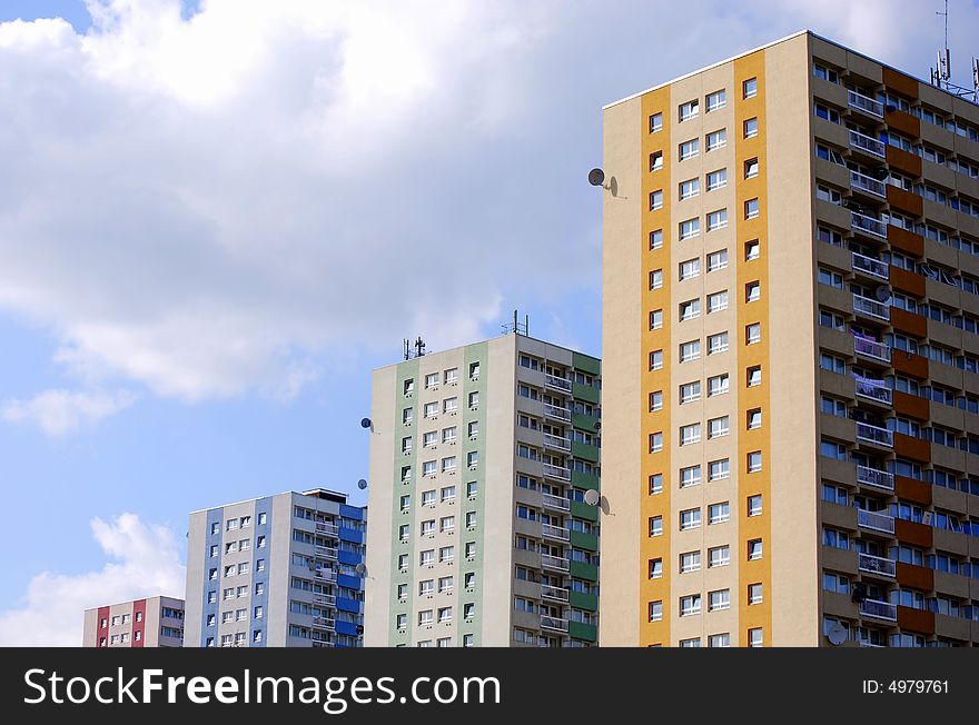 Four different coloured tower blocks. Four different coloured tower blocks