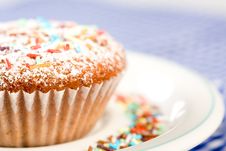 Tasty Muffin With Colorful Sprinkles Stock Photo