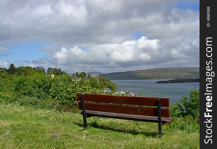 Isolated bench on a hill, overlooking the village of Tobermory. great view. Isolated bench on a hill, overlooking the village of Tobermory. great view