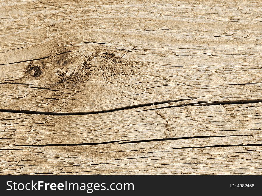 Wooden texture with curved cracks on surface. Wooden texture with curved cracks on surface.