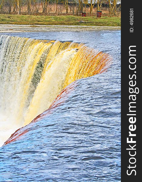 Big waterfall on river with blurred water. Big waterfall on river with blurred water.