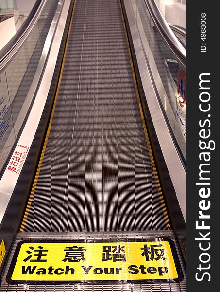 Moving walkway or Travelator at a Chinese airport.