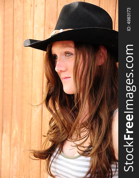 Girl wearing a cowboy hat. Girl wearing a cowboy hat