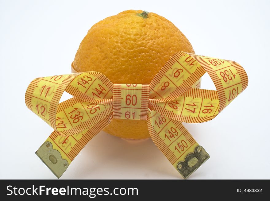 Orange with measuring tape. White background. Orange with measuring tape. White background.