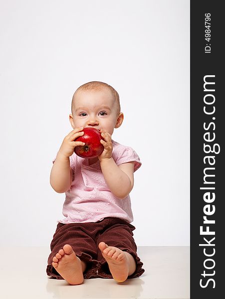 Portrait of baby with red apple. Portrait of baby with red apple