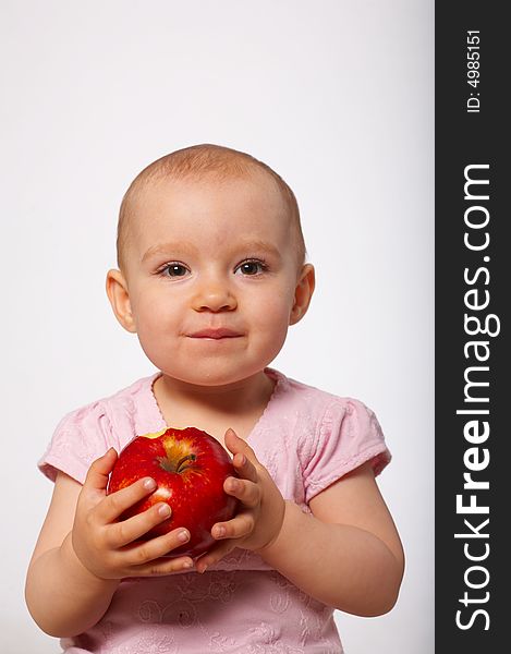 Portrait of baby with red apple. Portrait of baby with red apple