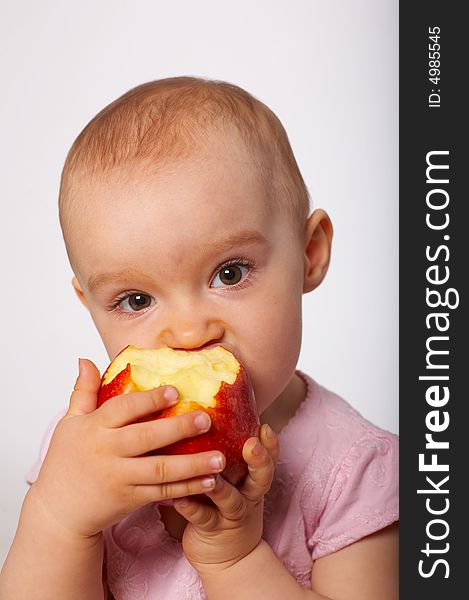 Portrait of baby with red apple. Portrait of baby with red apple