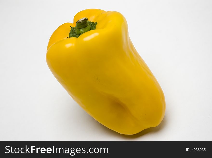 Yellow pepper in white background