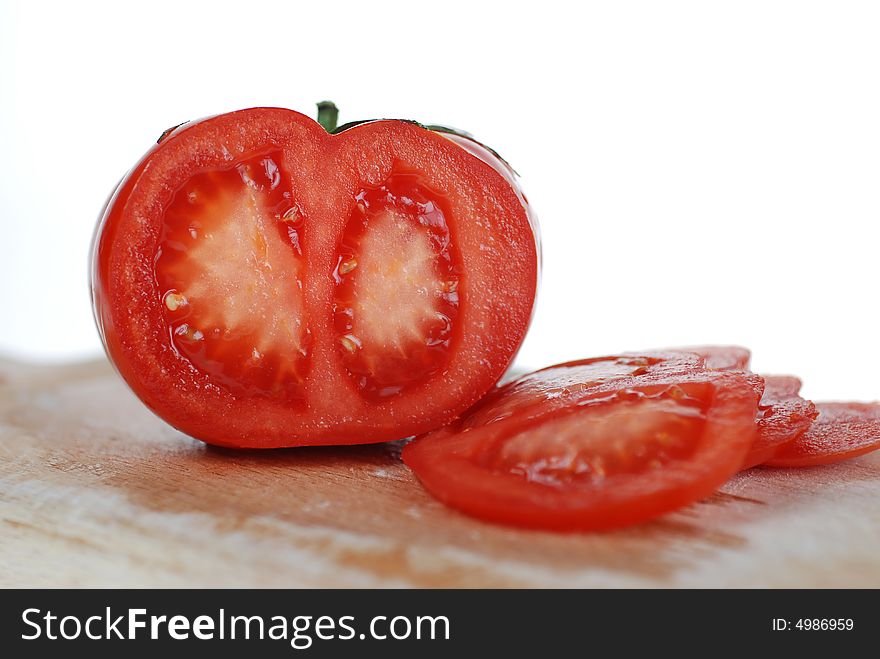 Fresh Tomato slices on cutting board