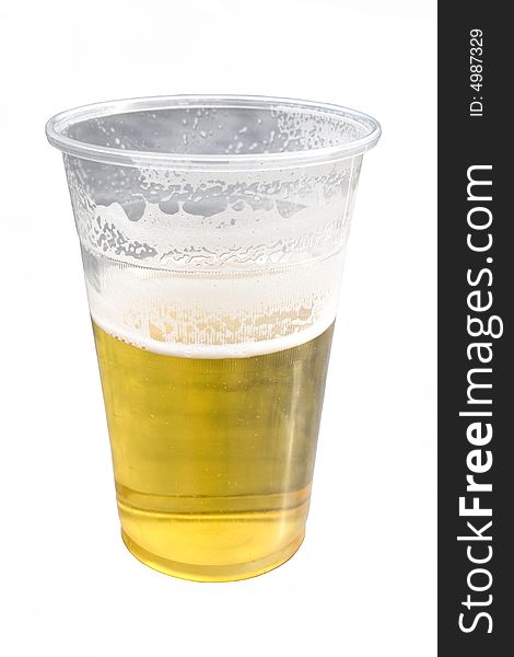 Glass of cold beer isolated over white