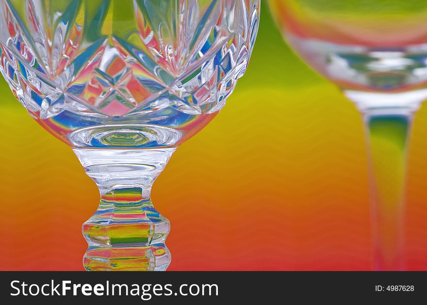 Wine glass over a colorful background