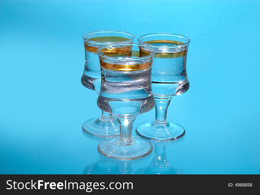 Three transparent glasses fulfilled clean water. Three transparent glasses fulfilled clean water