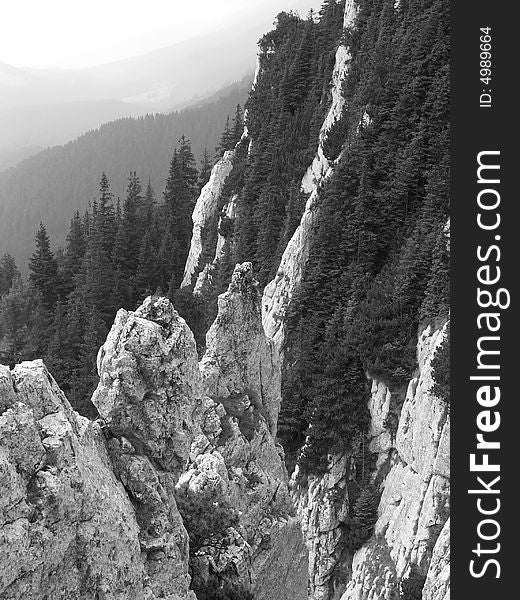 Mountains in Romania from unusual viewpoint. Black and white coloring draws all attention to the great altitude. Mountains in Romania from unusual viewpoint. Black and white coloring draws all attention to the great altitude