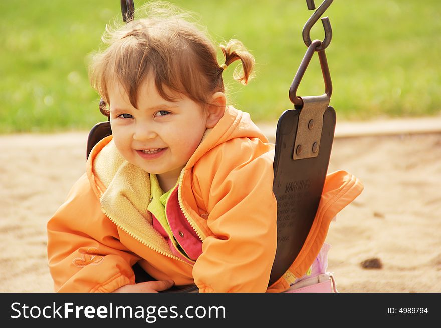 Smiling Little Girl at the Park