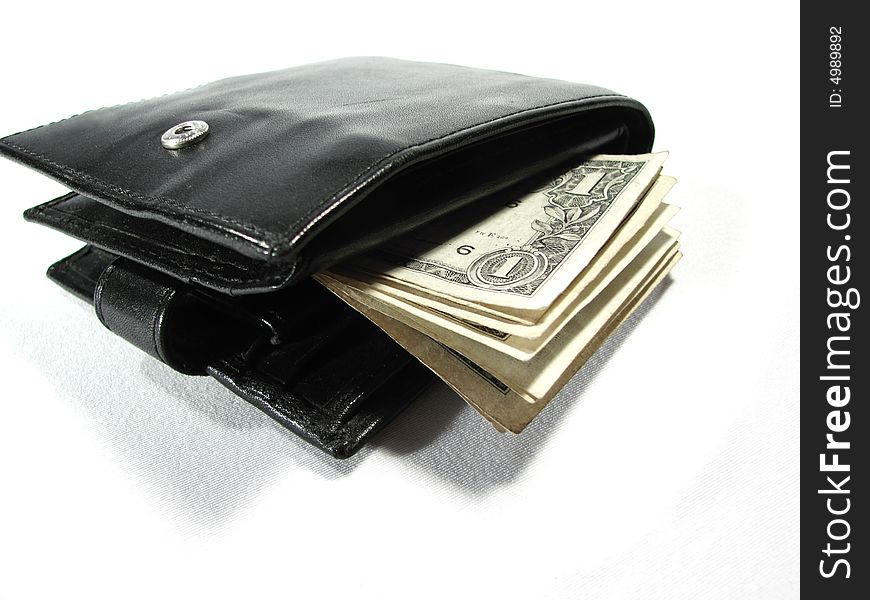 Black leather purse pouch with paper money dollars isolated on white. Black leather purse pouch with paper money dollars isolated on white