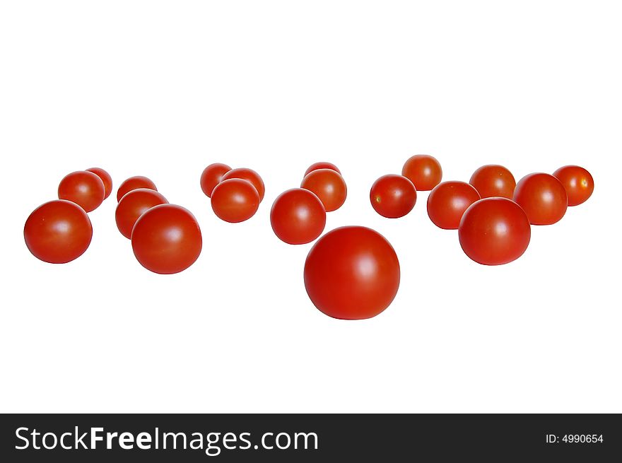 Small tomatoes are gathering together. Small tomatoes are gathering together