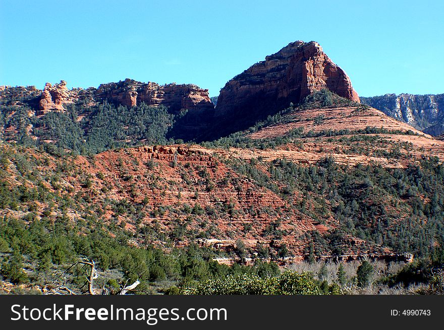 Photograph of the beautiful landscape in Sedona, Arizona. Visible sedimentary layers of rock.