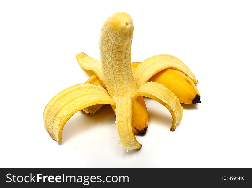 A peeled banana isolated with white background.